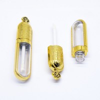 Unique Gold Capsule Shape Lip Gloss Tubes Injection Molded Lip Glaze Container Tube with Brush